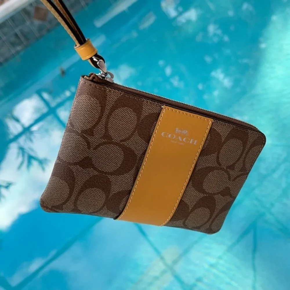 COACH Signature PVC Leather Corner Zip Wristlet